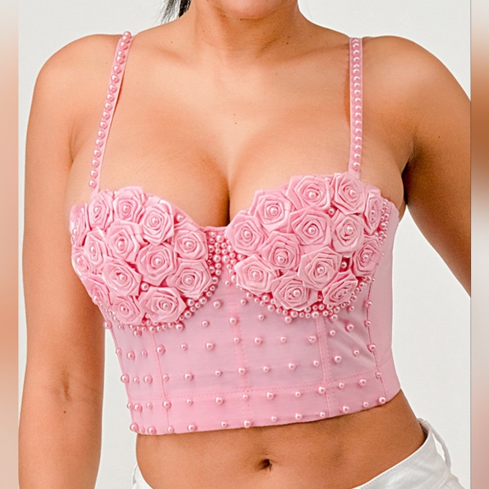 Pink cropped bustier top with dimensional rose appliques and pearl embellishments